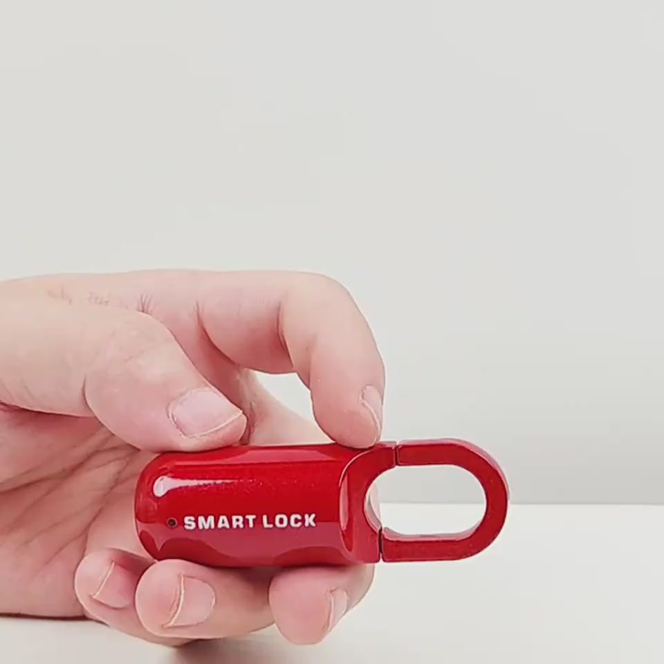 Ultra-Compact Fingerprint Padlock (0.13 lbs). Keyless access with fingerprint in 0.3 seconds. USB rechargeable. Perfect for travel, gym, or home. Red & black.